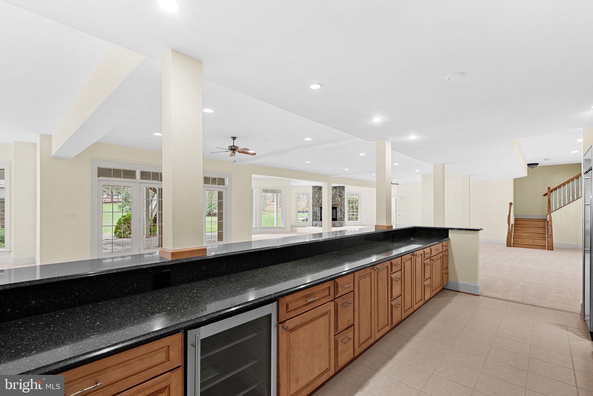 11913 Chapel Road Clifton, VA 20124 - Photo 102 of 124 a kitchen with stainless steel appliances granite countertop a sink and a white cabinets