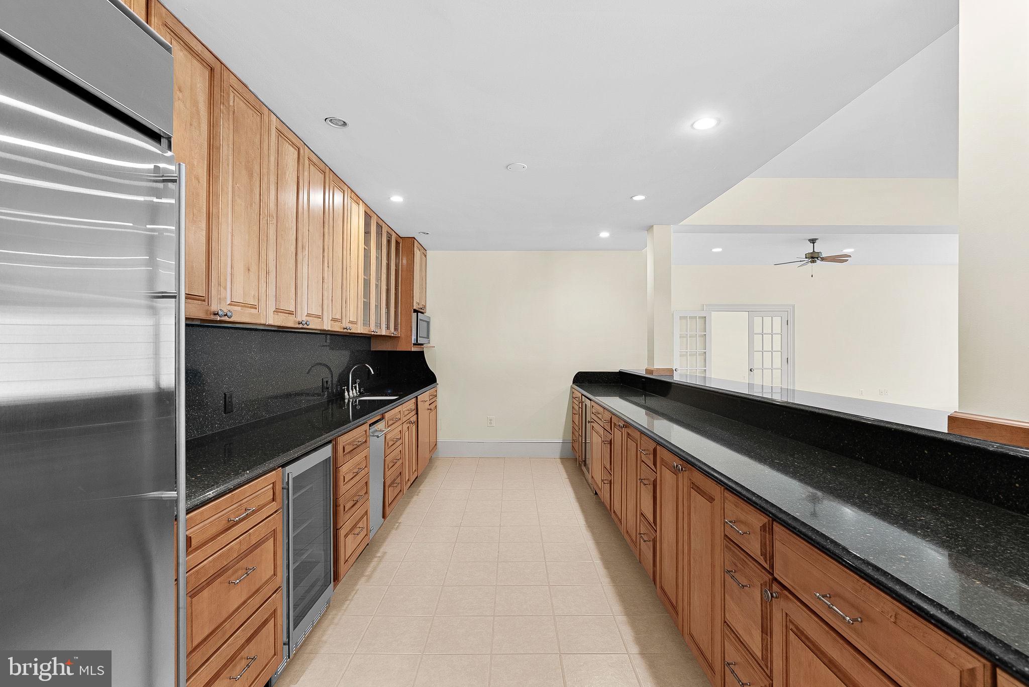 11913 Chapel Road Clifton, VA 20124 - Photo 103 of 124 a kitchen with stainless steel appliances a sink stove and cabinets