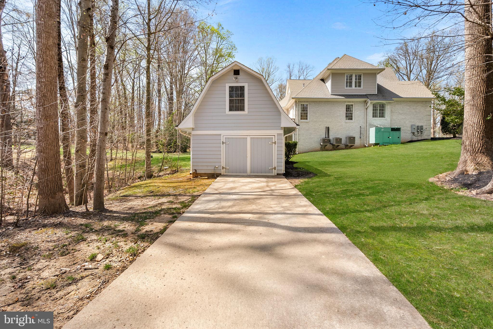 11913 Chapel Road Clifton, VA 20124 - Photo 124 of 124 a front view of a house with a yard