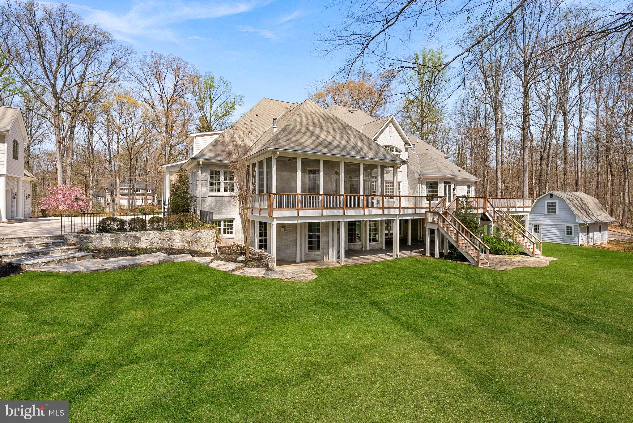 11913 Chapel Road Clifton, VA 20124 - Photo 16 of 124 a front view of a house with a garden and trees