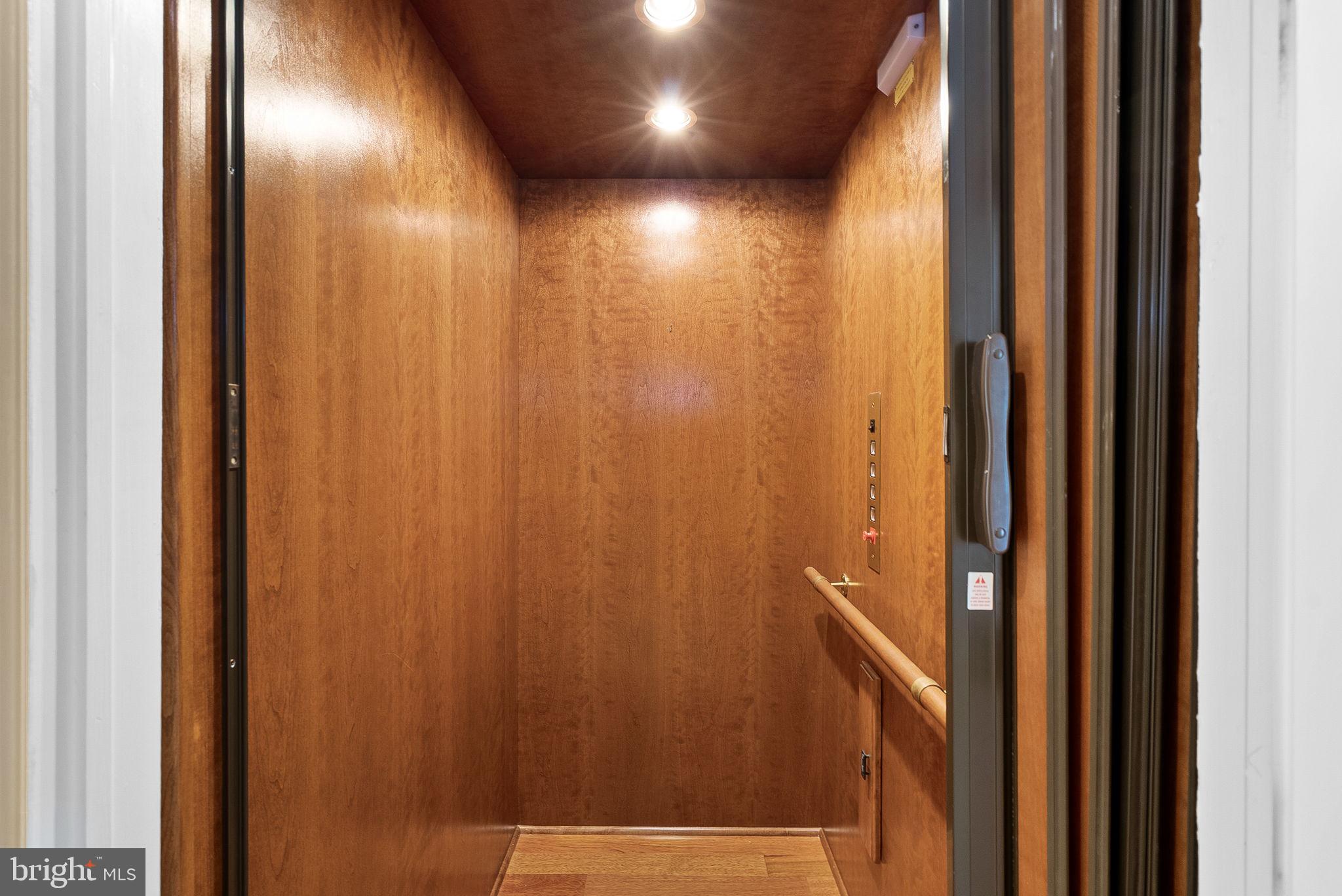 11913 Chapel Road Clifton, VA 20124 - Photo 28 of 124 Cherry finished elevator services all 3 levels