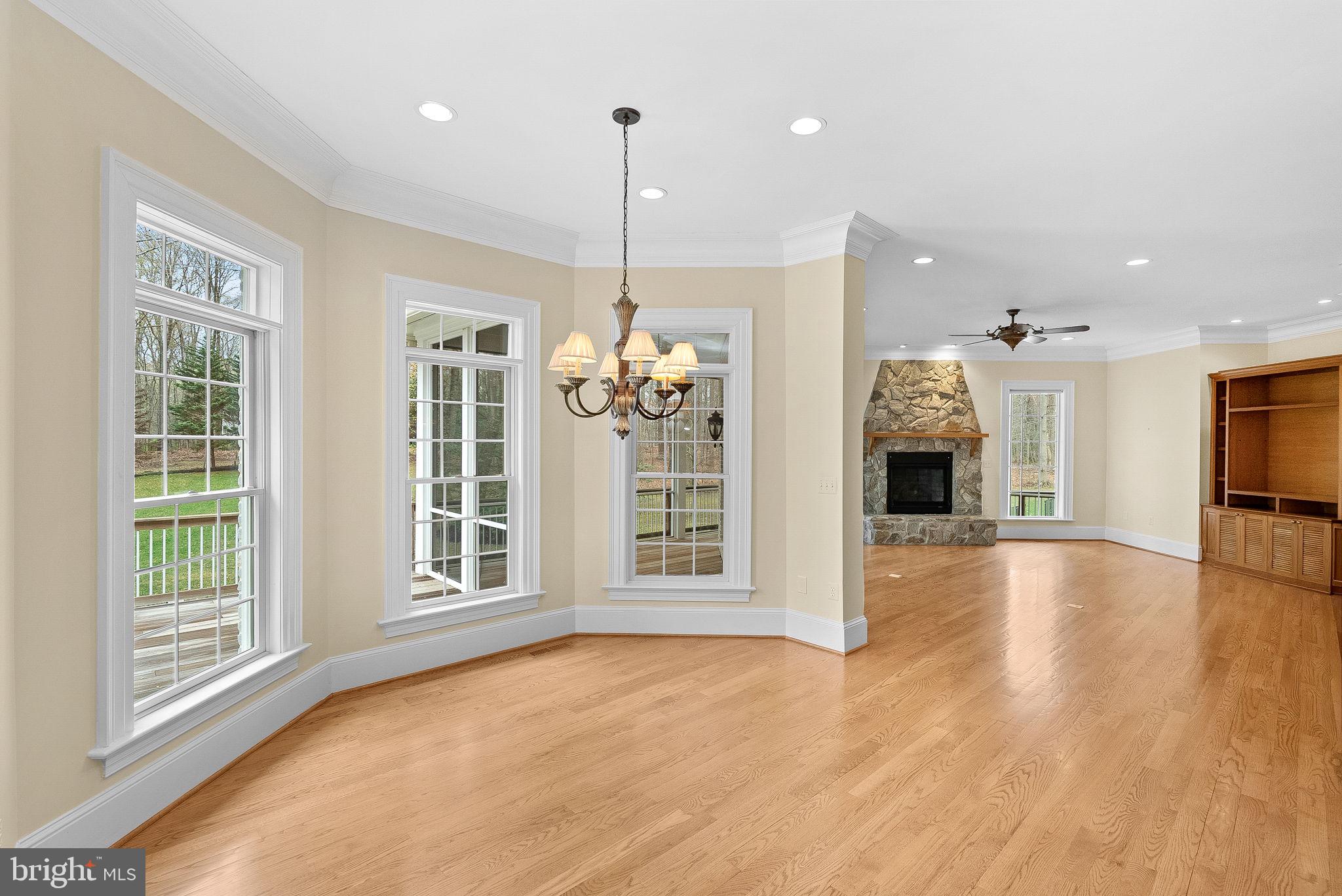 11913 Chapel Road Clifton, VA 20124 - Photo 43 of 124 a view of an empty room with window and hardwood floor