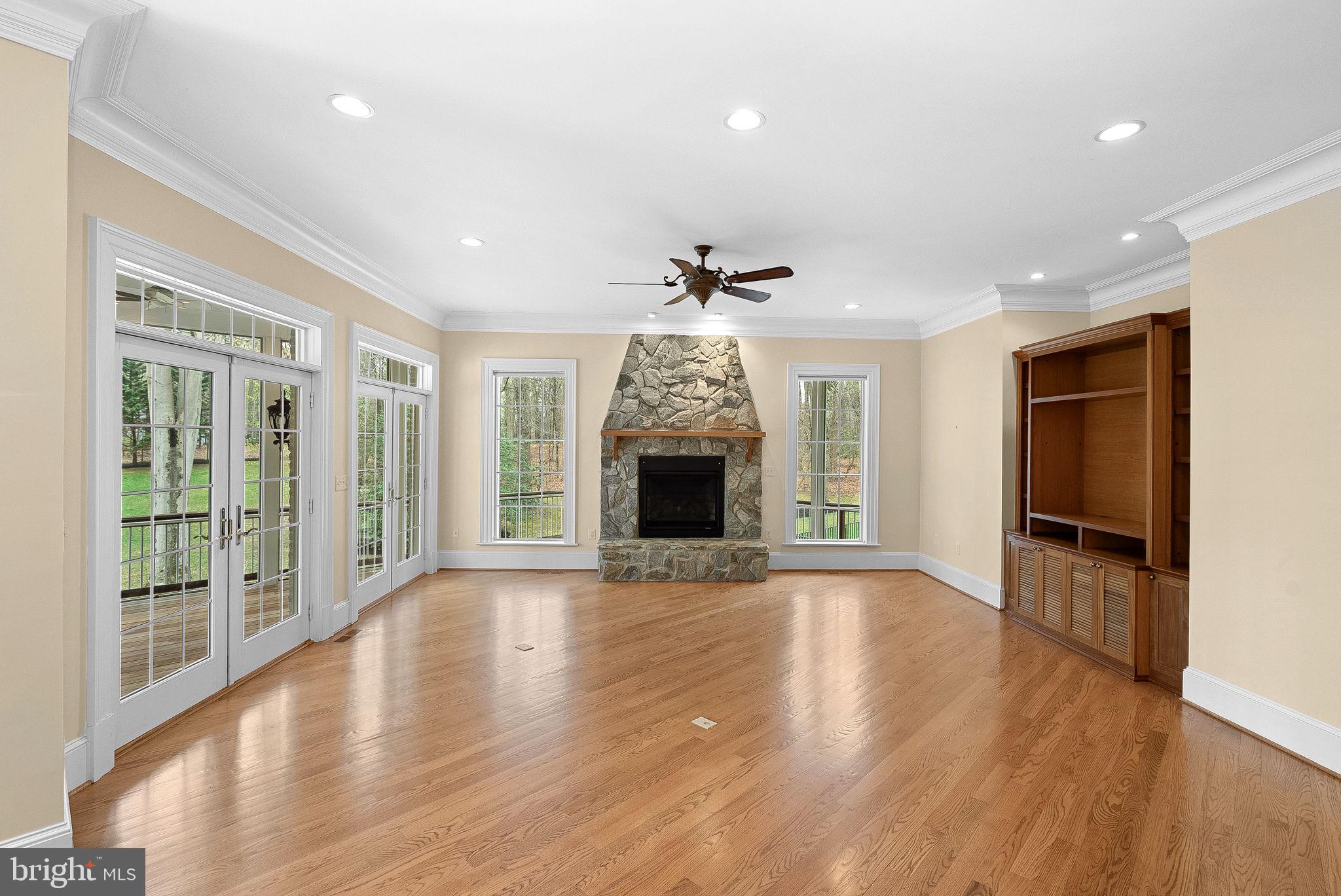 11913 Chapel Road Clifton, VA 20124 - Photo 44 of 124 a view of a room with wooden floor and a fireplace