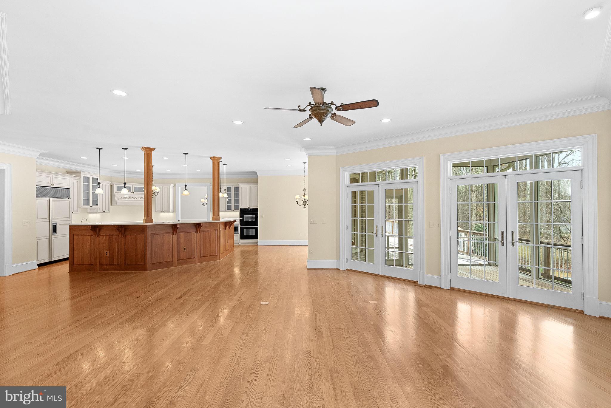 11913 Chapel Road Clifton, VA 20124 - Photo 45 of 124 a view of large living room with wooden floor and a large window