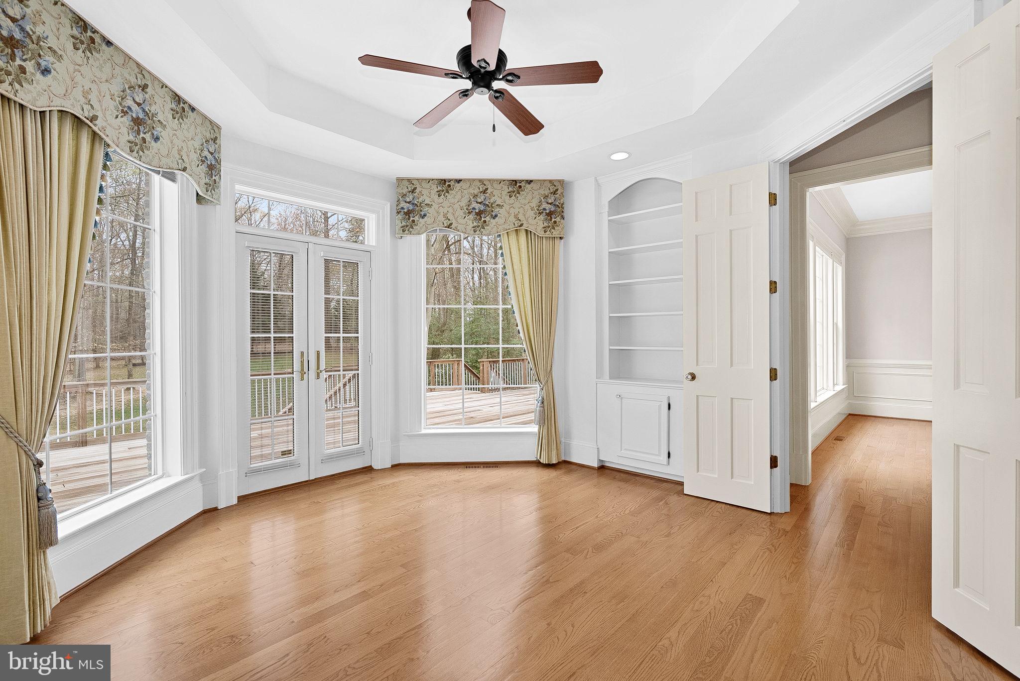 11913 Chapel Road Clifton, VA 20124 - Photo 65 of 124 a view of livingroom with hardwood floor and ceiling fan