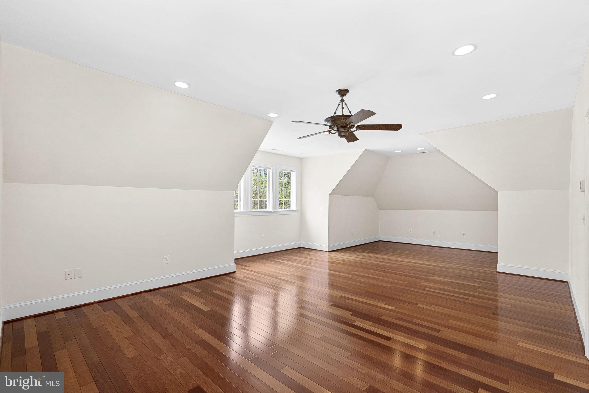 11913 Chapel Road Clifton, VA 20124 - Photo 79 of 124 a view of empty room with wooden floor and fan