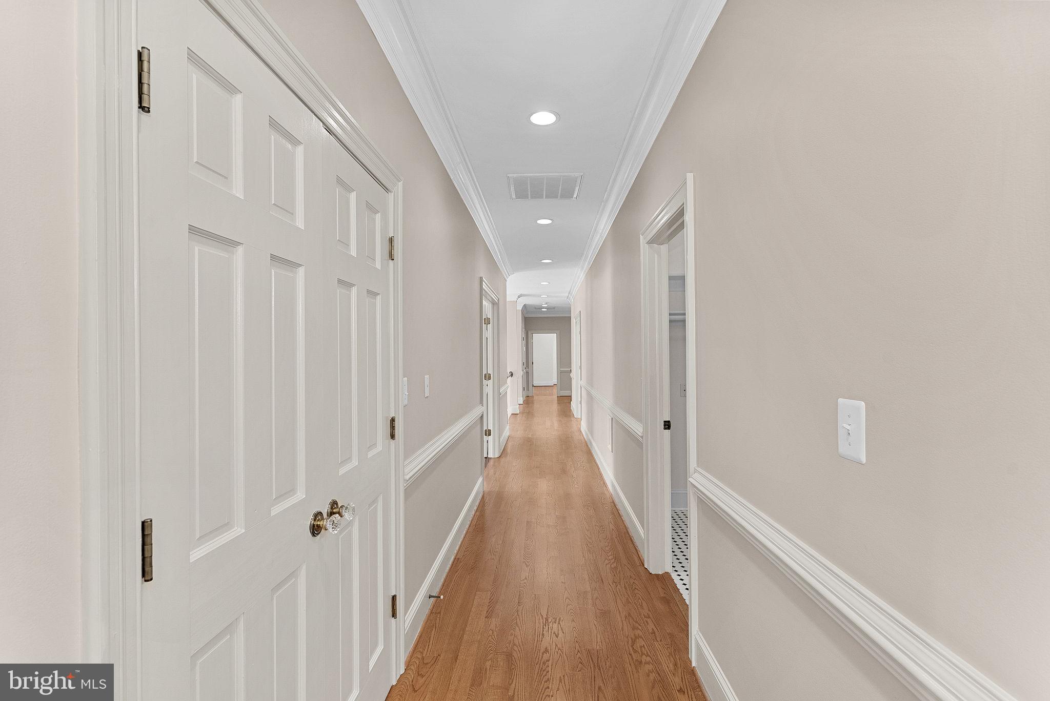 11913 Chapel Road Clifton, VA 20124 - Photo 90 of 124 a view of a hallway with wooden floor