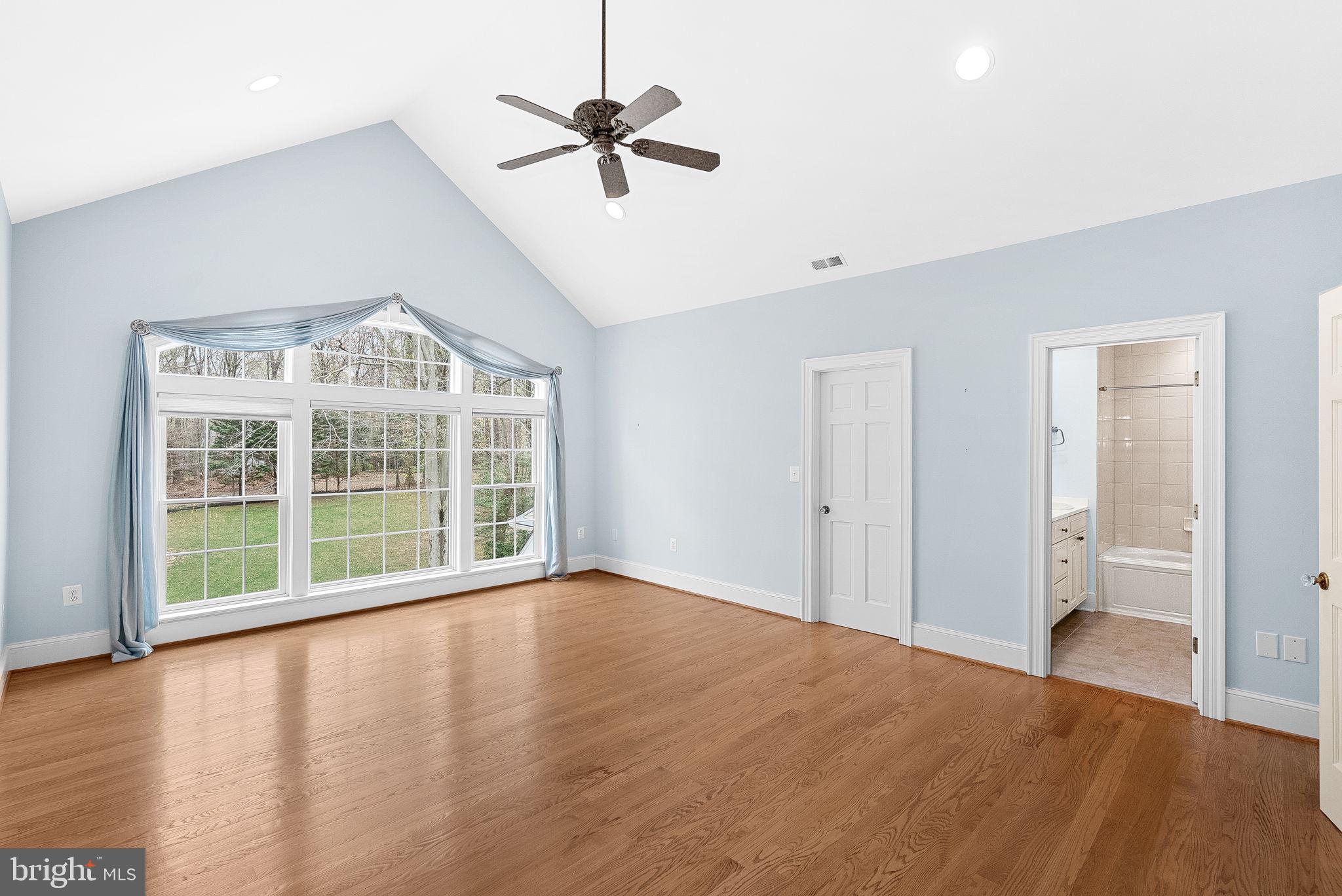 11913 Chapel Road Clifton, VA 20124 - Photo 92 of 124 a view of an empty room with a window and wooden floor