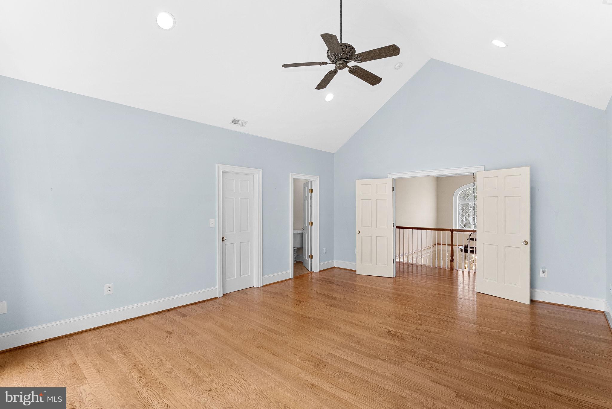 11913 Chapel Road Clifton, VA 20124 - Photo 93 of 124 a view of empty room with wooden floor and ceiling fan
