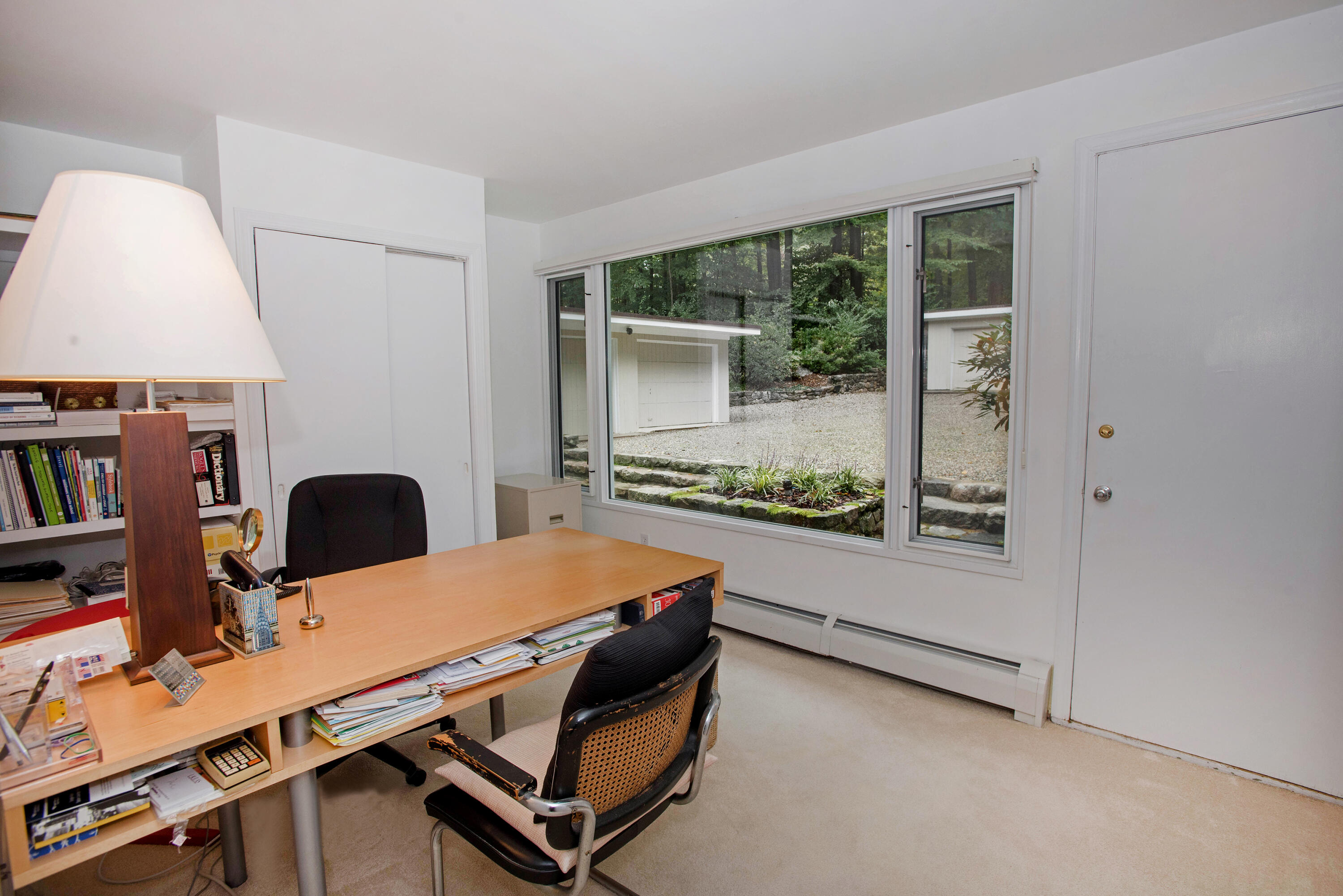 154 Indian Rock Road New Canaan, CT 06840 - Photo 16 of 33 a room with furniture and a window