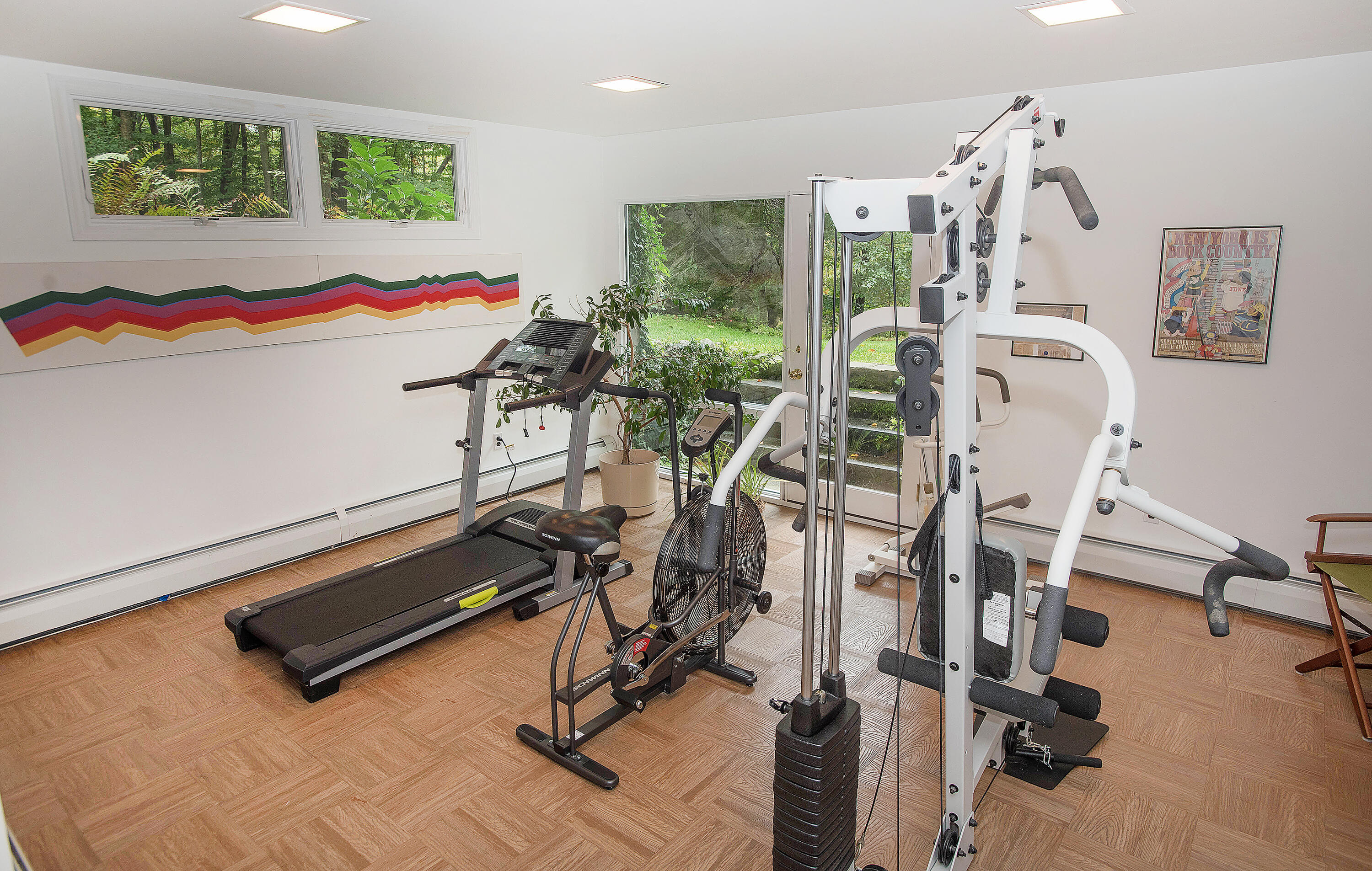 154 Indian Rock Road New Canaan, CT 06840 - Photo 21 of 33 a view of a room with gym equipment