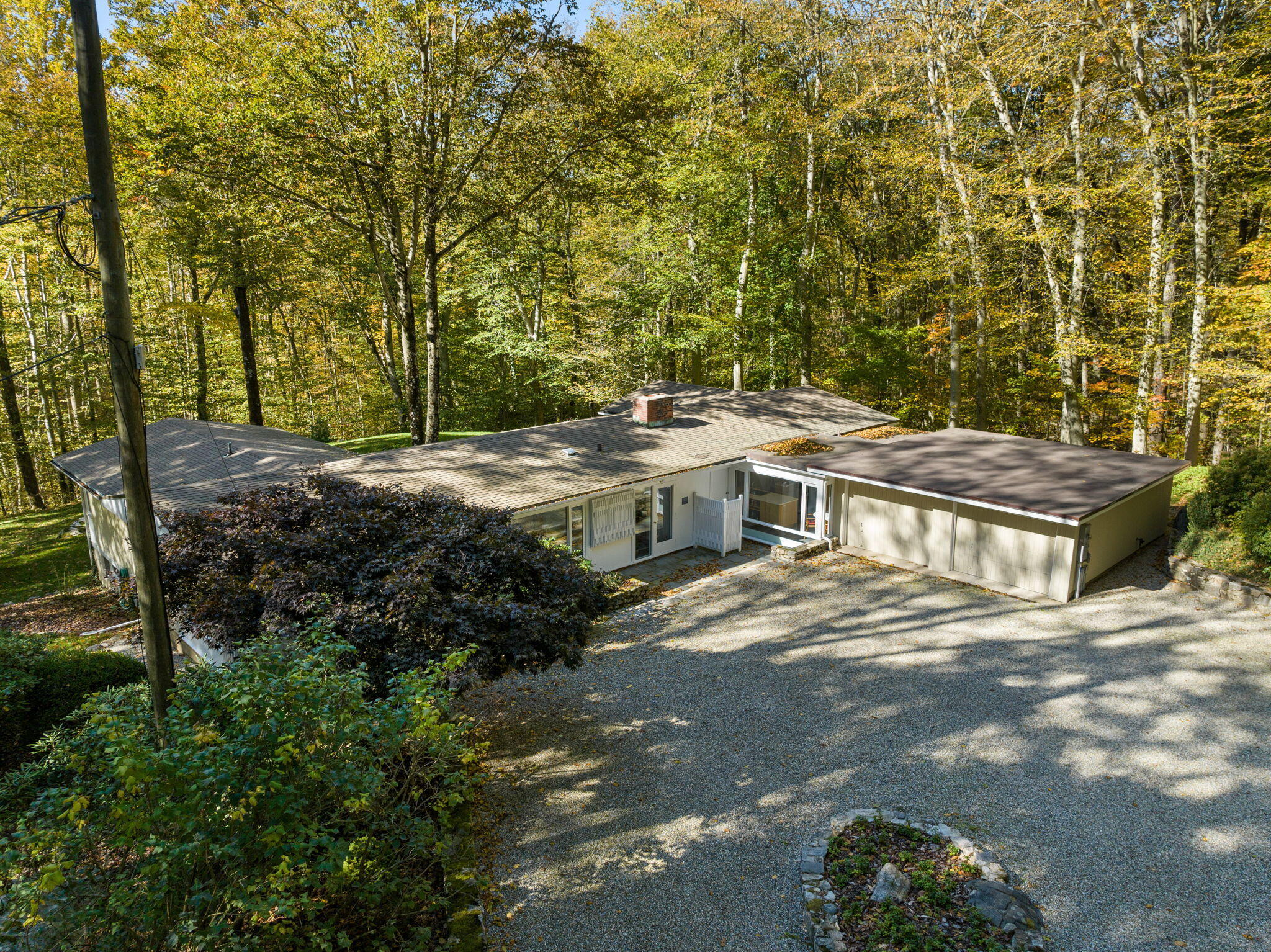 154 Indian Rock Road New Canaan, CT 06840 - Photo 29 of 33 a view of a house with a yard