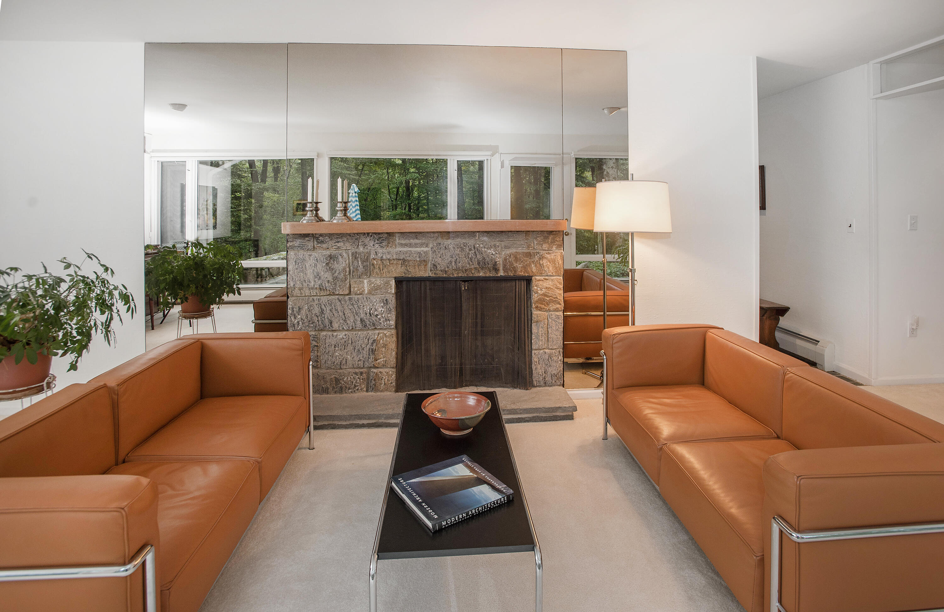 154 Indian Rock Road New Canaan, CT 06840 - Photo 8 of 33 a living room with furniture and a fireplace