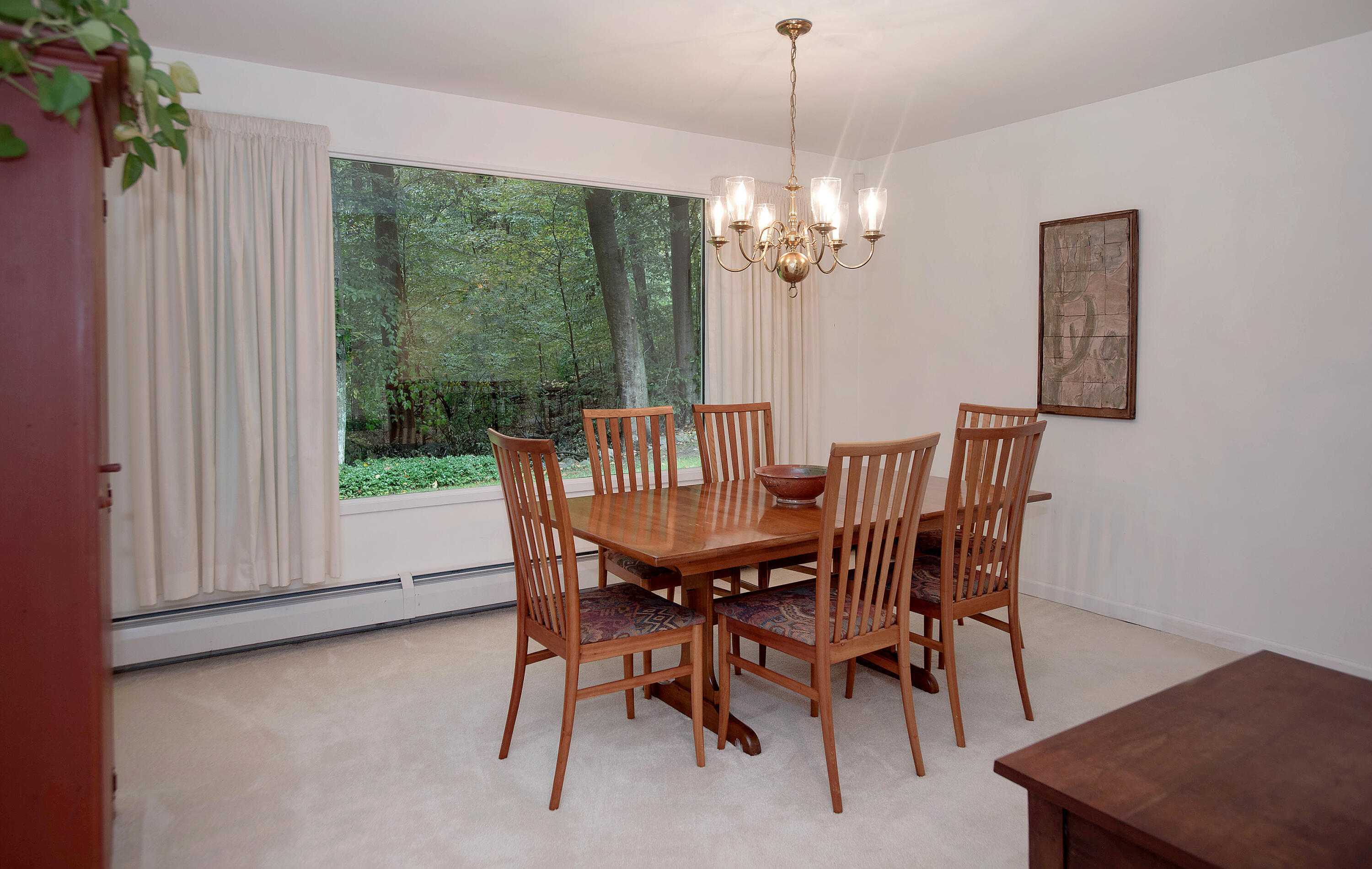 154 Indian Rock Road New Canaan, CT 06840 - Photo 9 of 33 a view of a dining room with furniture window and outside view