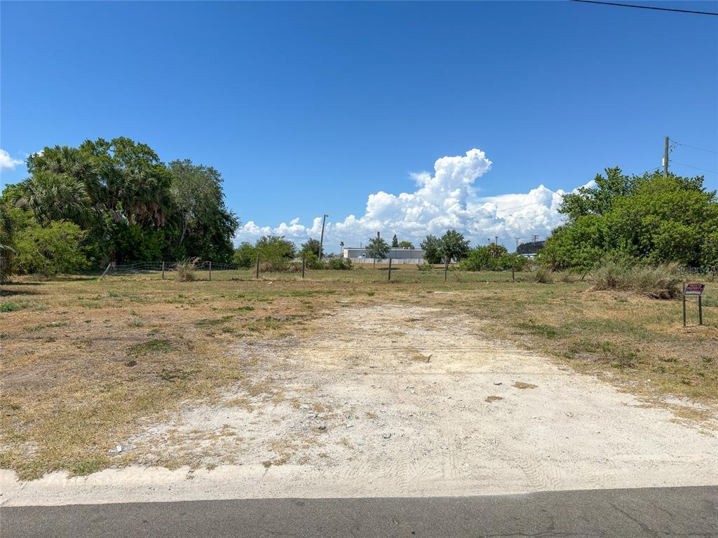 601 Flamingo Drive Apollo Beach, FL 33572 - Photo 8 of 15 a front view of a house with a yard