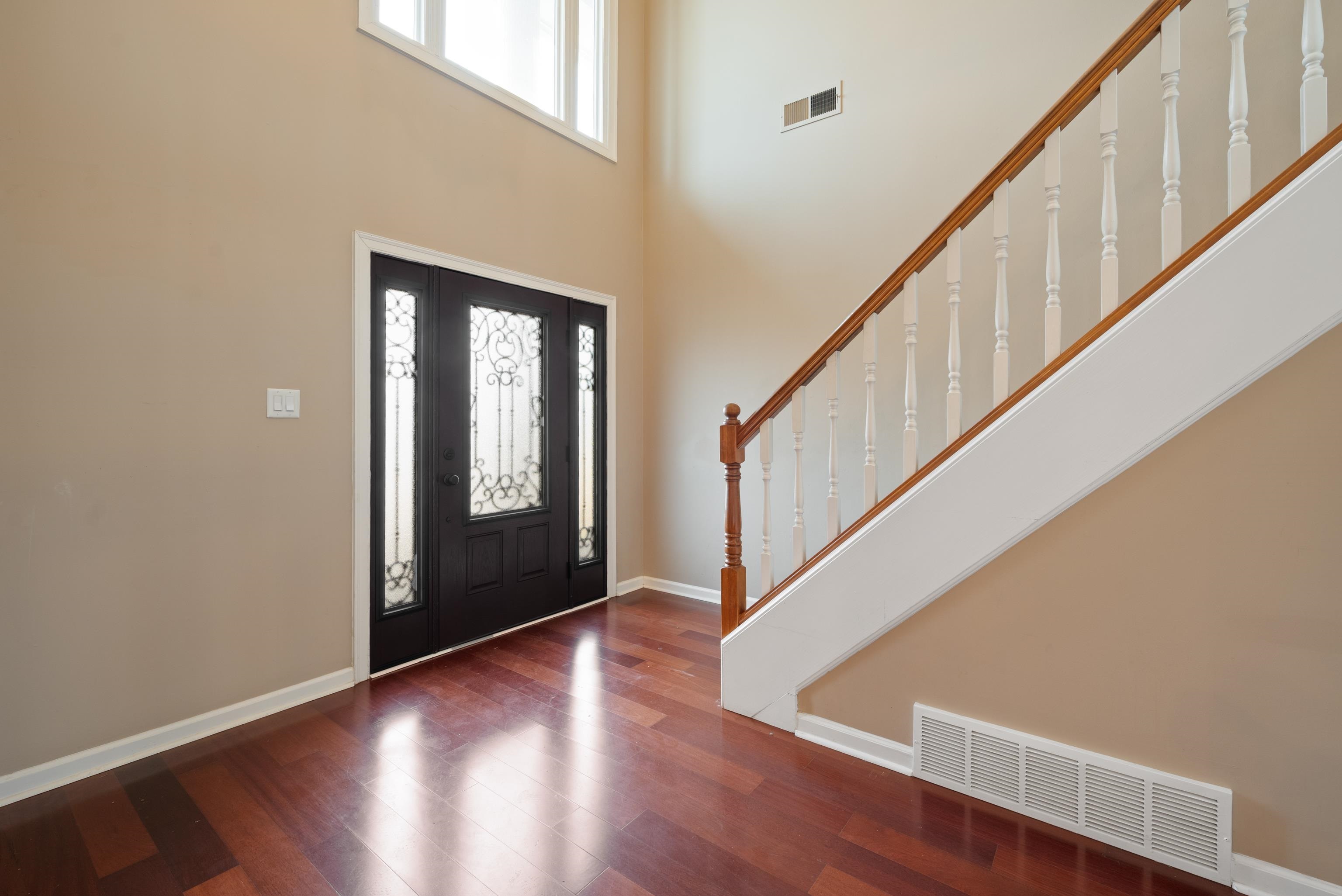 1553 John Ridge Drive Collierville, TN 38017 - Photo 18 of 40 a view of an entryway with wooden floor