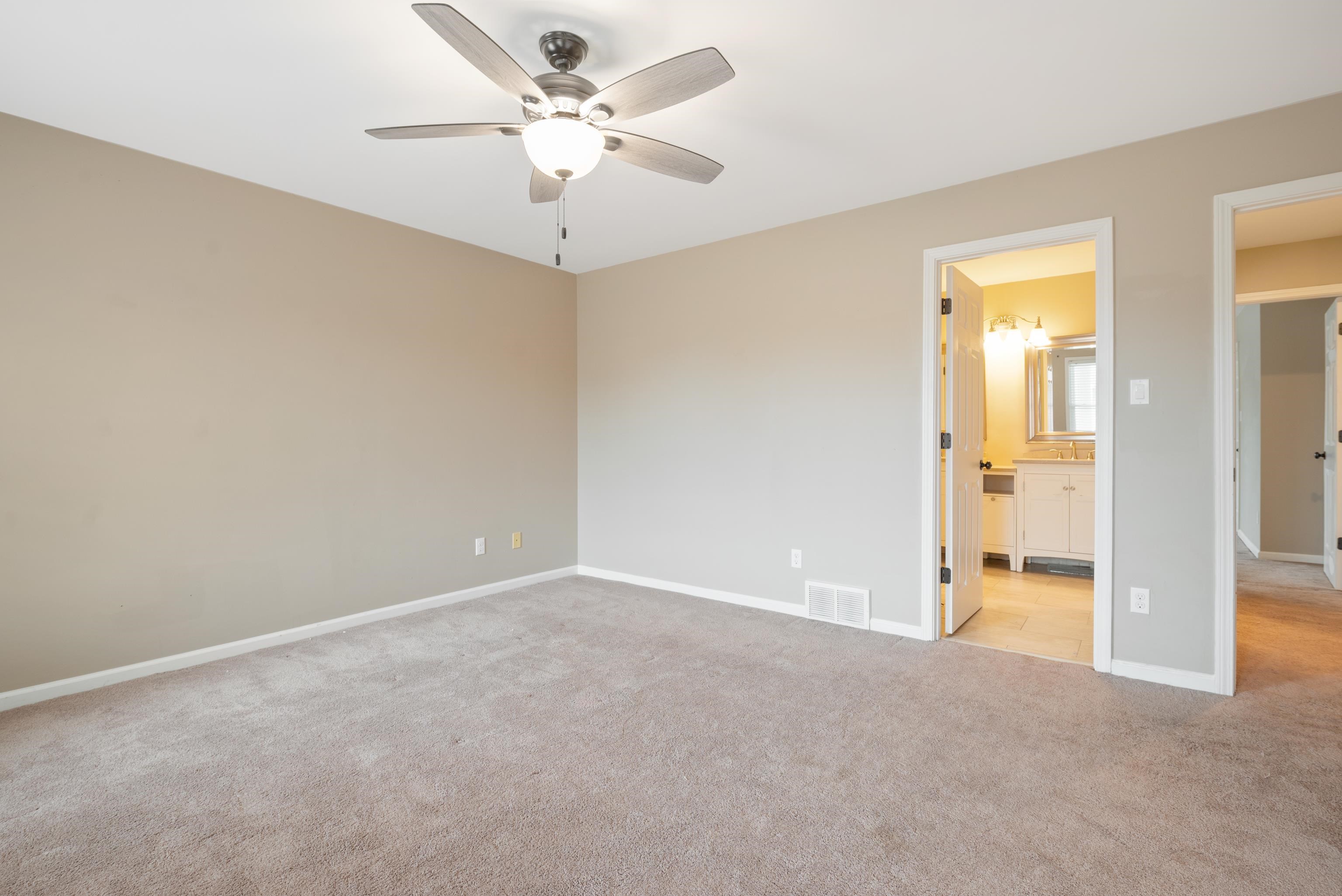 1553 John Ridge Drive Collierville, TN 38017 - Photo 25 of 40 an empty room with a bathroom