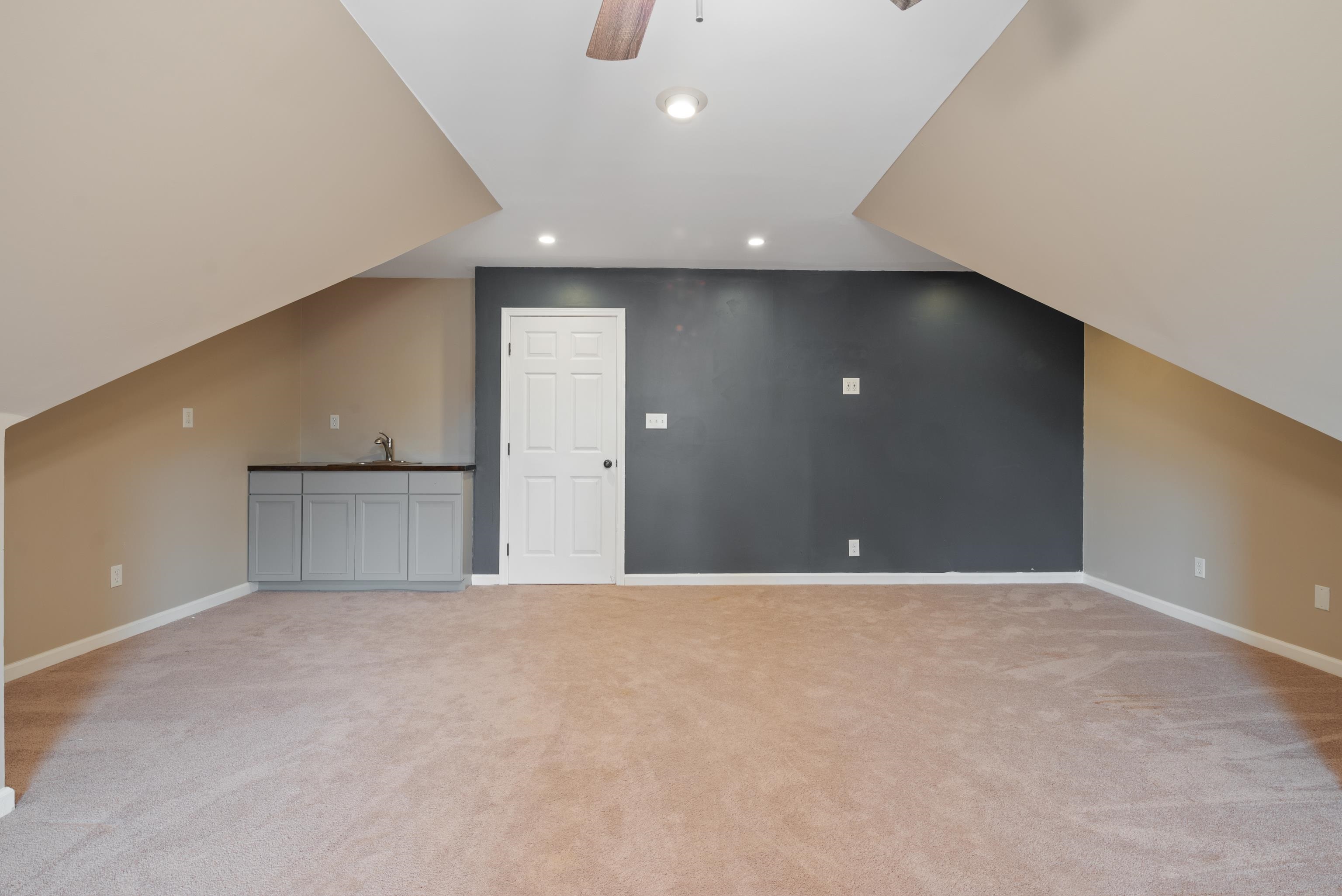 1553 John Ridge Drive Collierville, TN 38017 - Photo 34 of 40 a view of an empty room with a kitchen