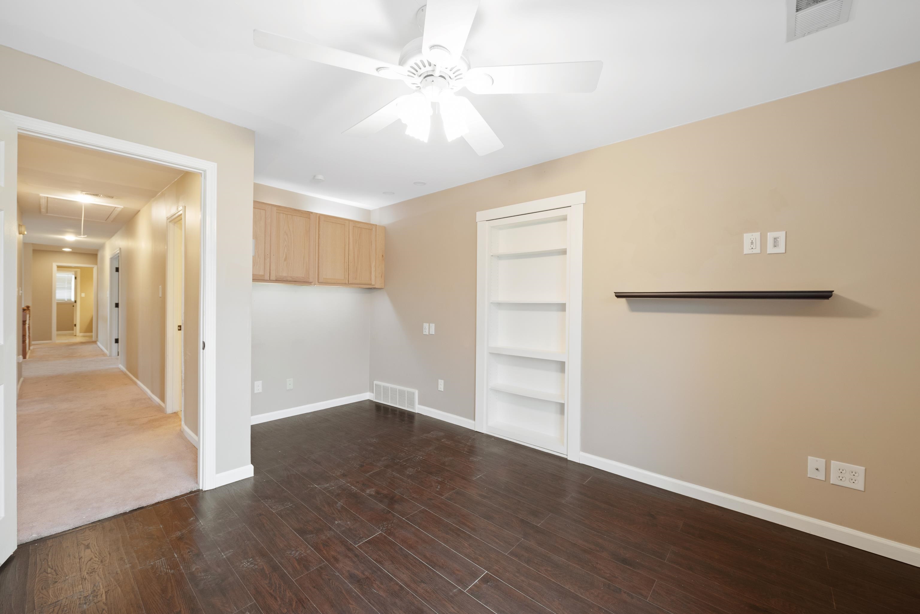 1553 John Ridge Drive Collierville, TN 38017 - Photo 35 of 40 a view of a hallway with wooden floor