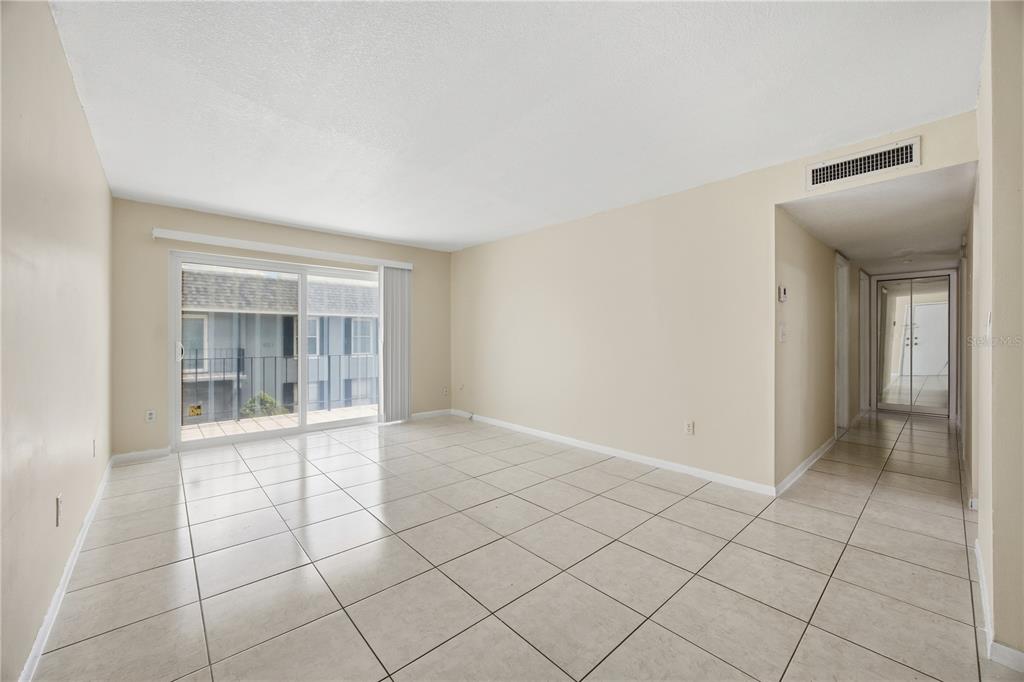 925 West Oak Ridge Road, Unit 925C Orlando, FL 32809 - Photo 2 of 15 a view of an empty room and window