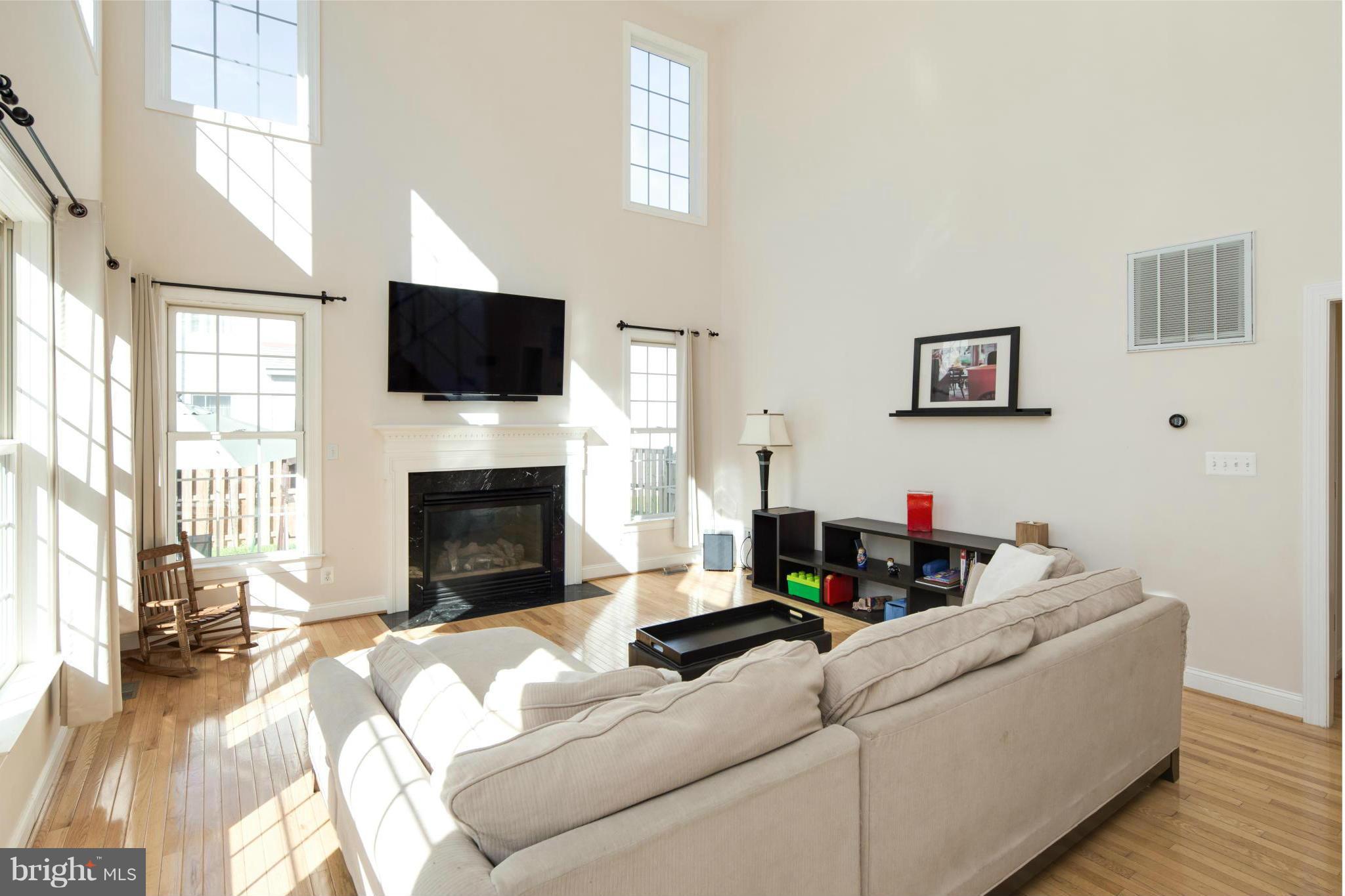 101 West George Mason Road Falls Church, VA 22046 - Photo 13 of 30 Gas Fireplace Warms the Family Room