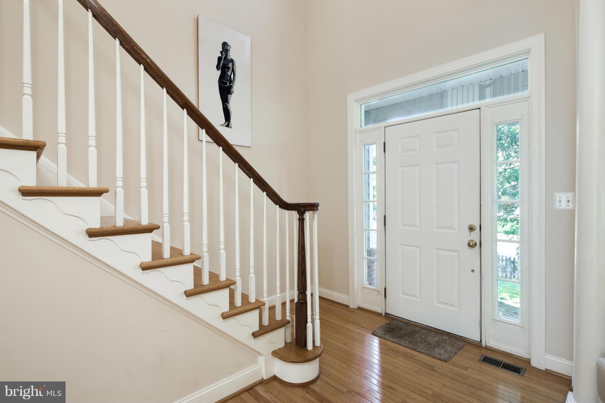 101 West George Mason Road Falls Church, VA 22046 - Photo 3 of 30 Cathedral Ceiling and Grand Stairs in Foyer