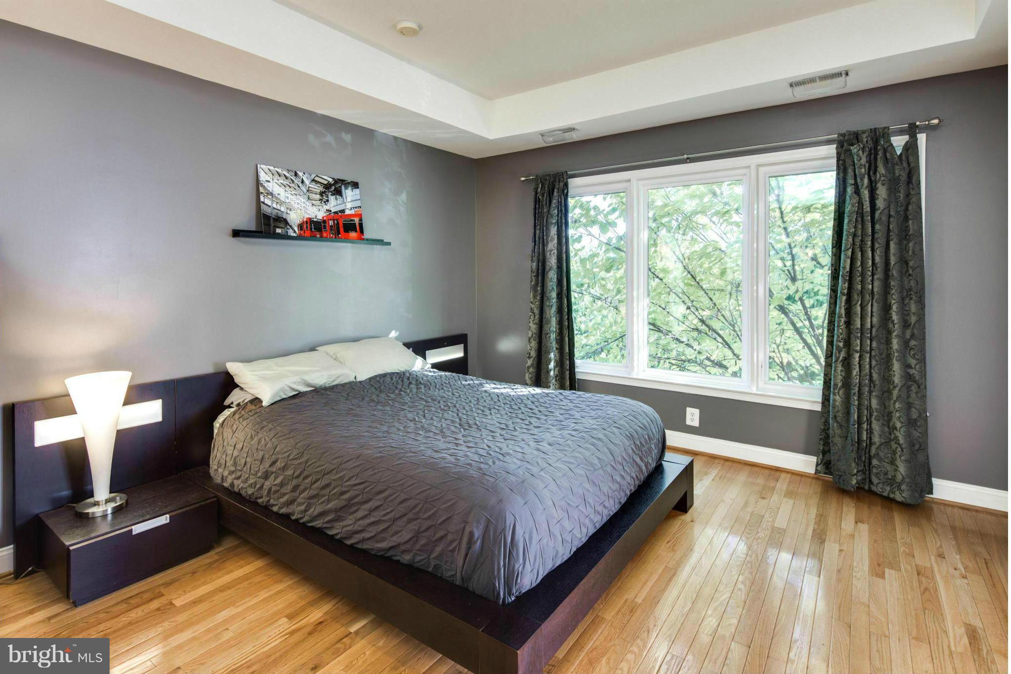 101 West George Mason Road Falls Church, VA 22046 - Photo 22 of 30 Master Bedroom with Shiny Hardwood Floors