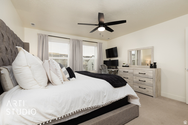 1713 South Windemere Road Santaquin, UT 84655 - Photo 14 of 40 Spacious bedroom featuring light-colored walls and soft carpeting