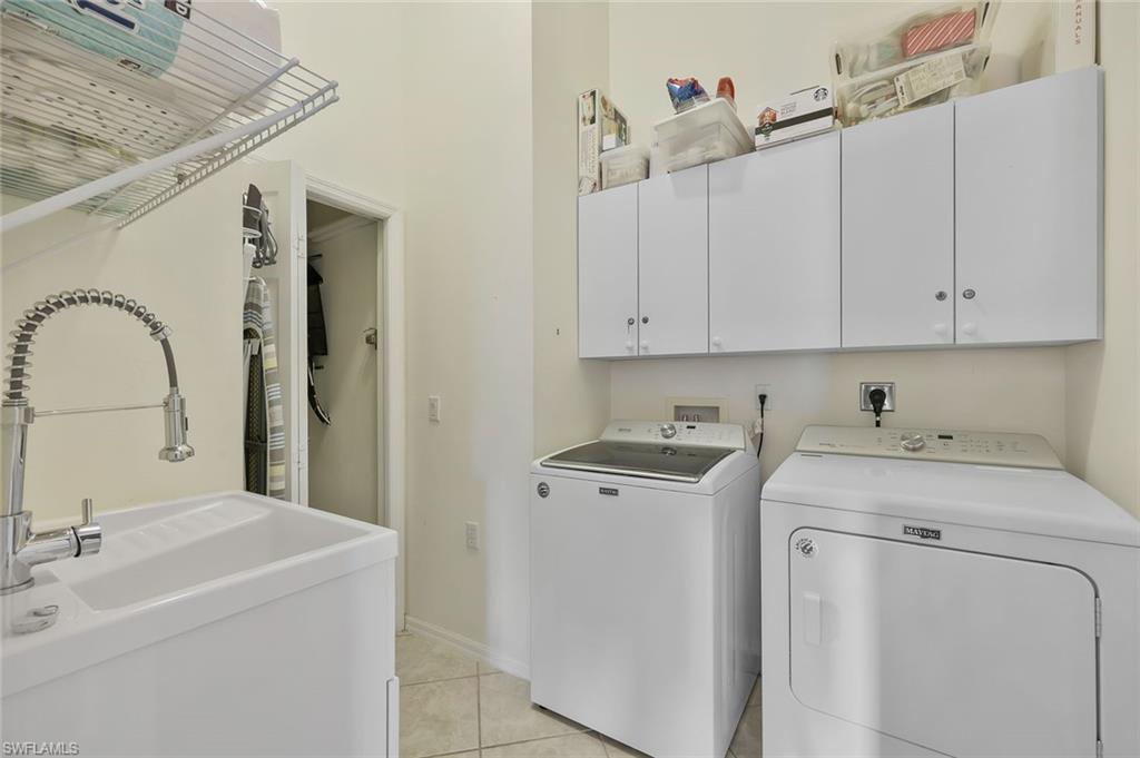 2395 Bayou Lane, Unit 7304 Naples, FL 34112 - Photo 20 of 27 LAUNDRY WITH A SET TUB