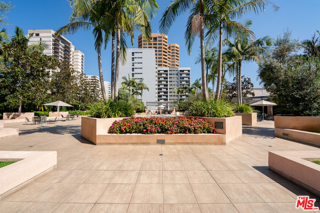 10490 Wilshire Boulevard, Unit 1402 Los Angeles, CA 90024 - Photo 35 of 67 a view of a patio with couches and a fire pit