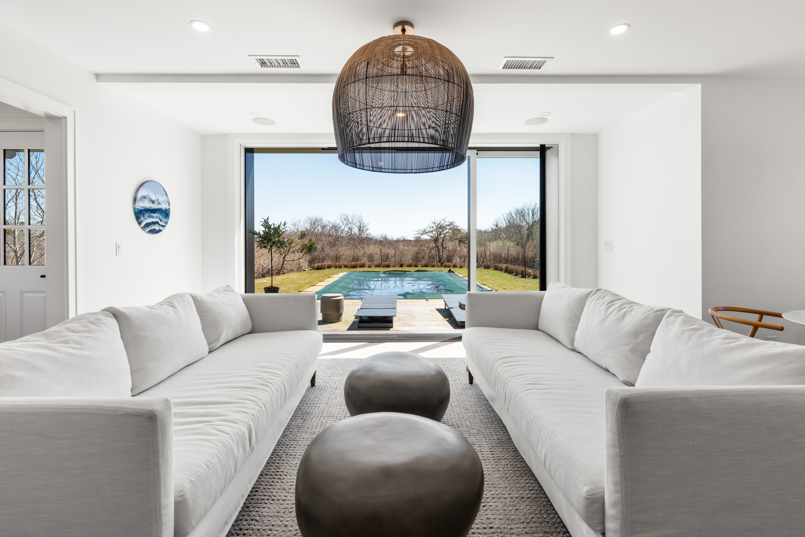174 Cliff Road Nantucket, MA 02554 - Photo 36 of 49 a living room with furniture and a large window