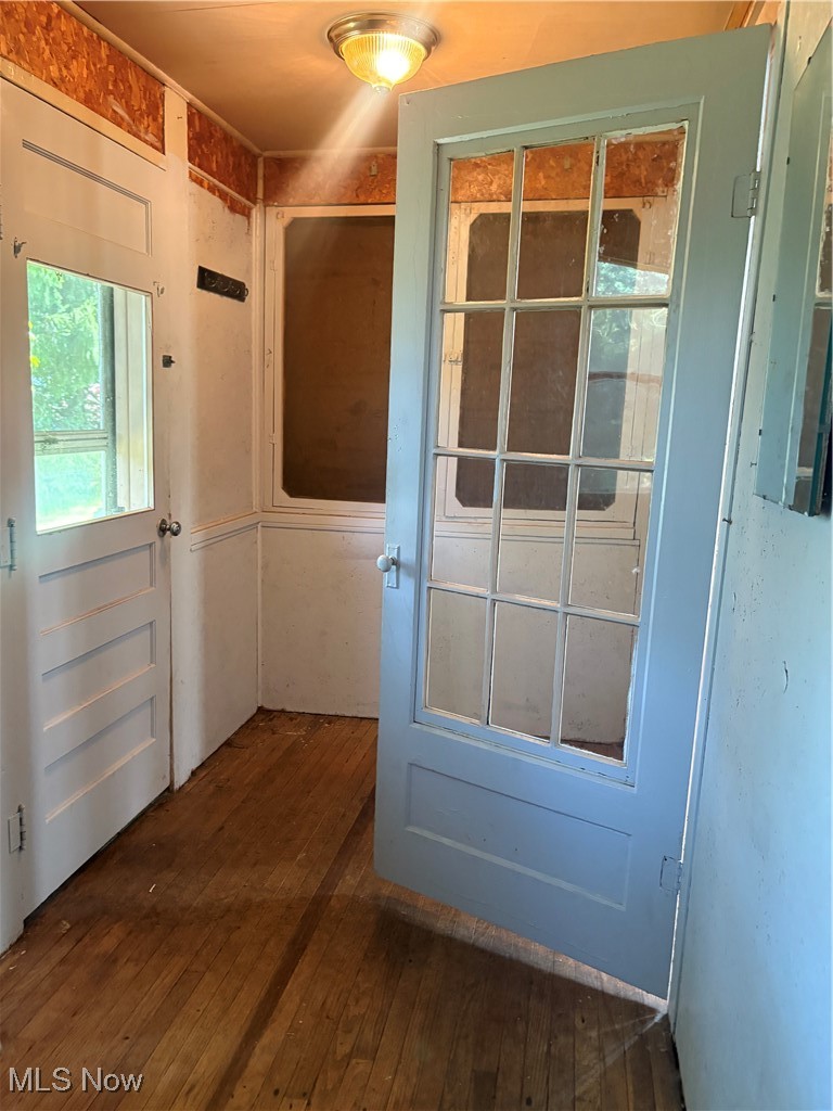 11 Front Street Rittman, OH 44270 - Photo 17 of 31 Doorway to outside with dark wood finished floors