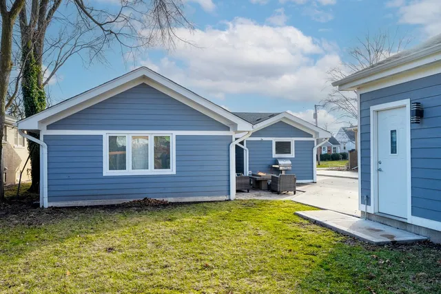 a front view of a house with swimming pool