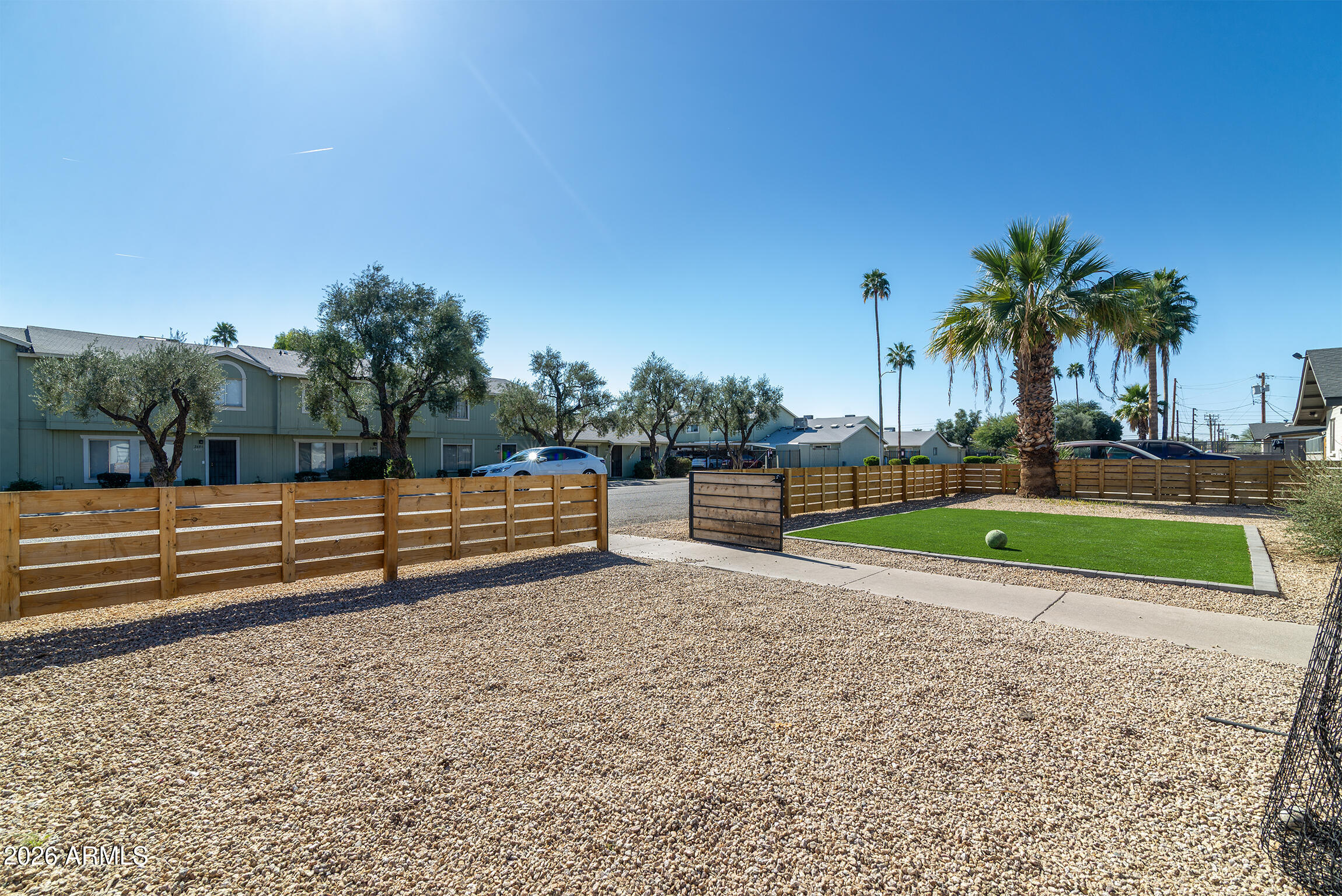 2608 West Pierson Street Phoenix, AZ 85017 - Photo 16 of 32 a view of park with wooden fence