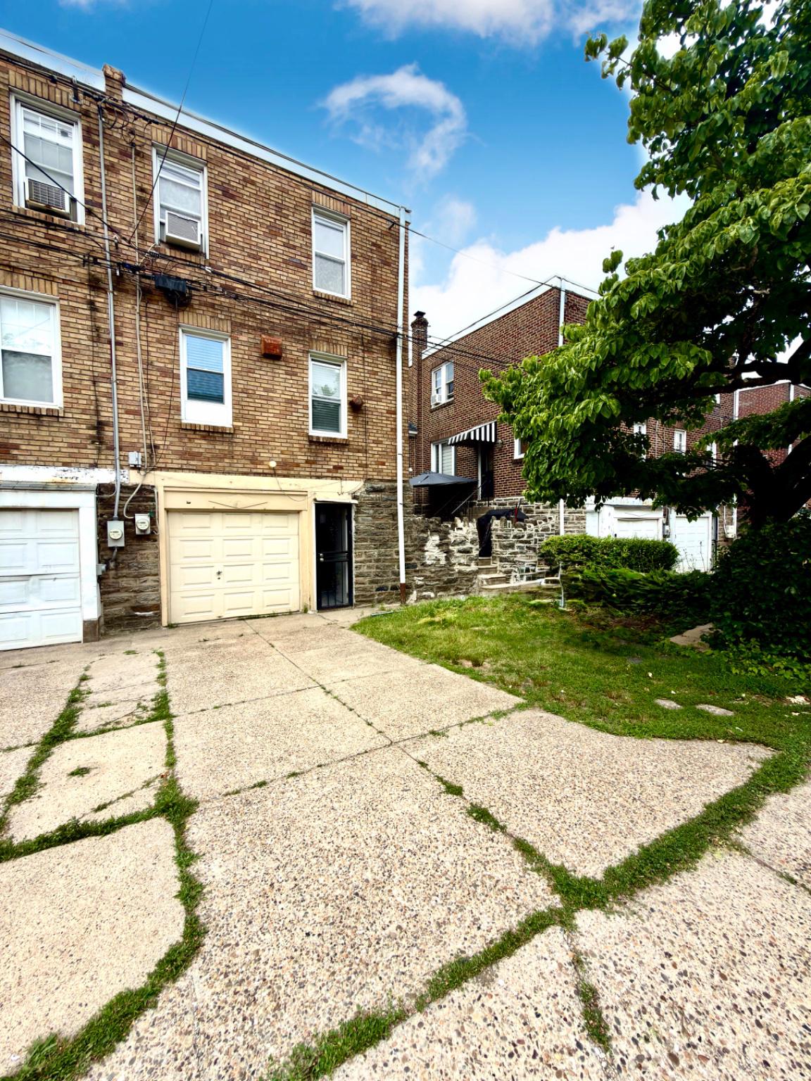 1723 Chelsea Road Elkins Park, PA 19027 - Photo 32 of 38 a view of a building with a yard