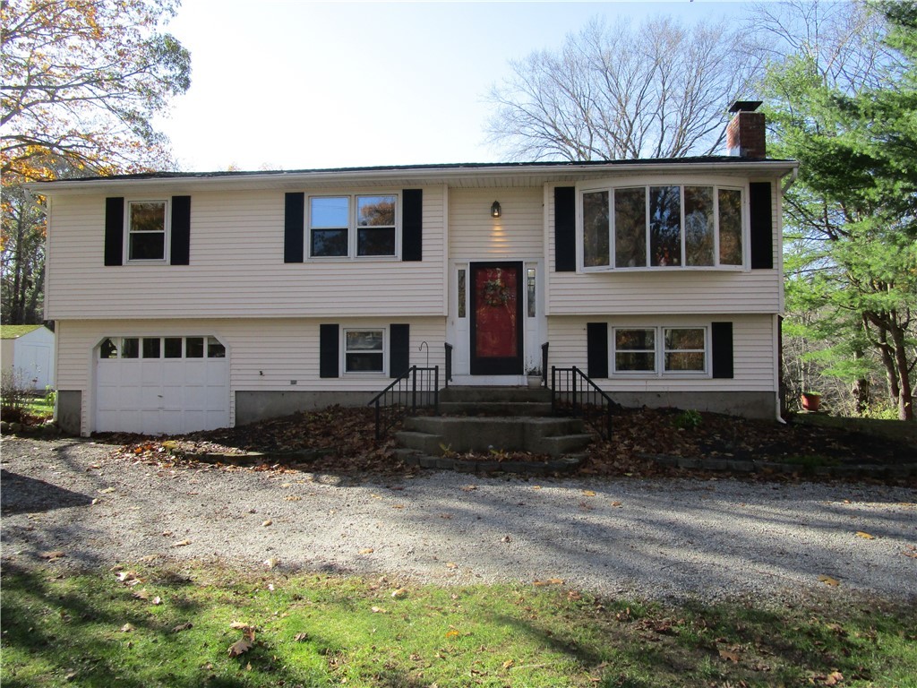 285 Log Bridge Road Coventry, RI 02816 - Photo 2 of 39 Another front view of the Raised Ranch style home with vinyl siding and new 2020 roof.