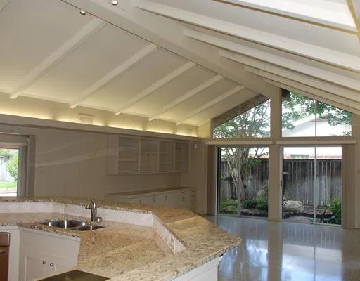 a bathroom with a sink and a large mirror