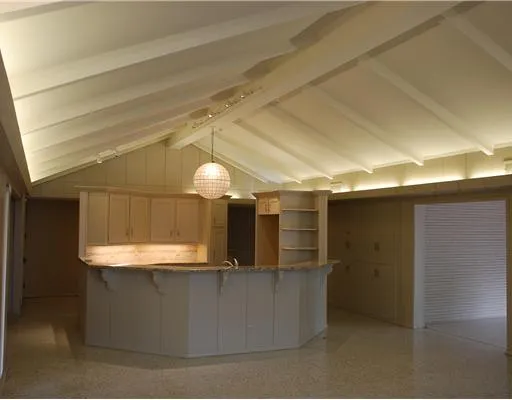 a view of a living room with a wooden floors