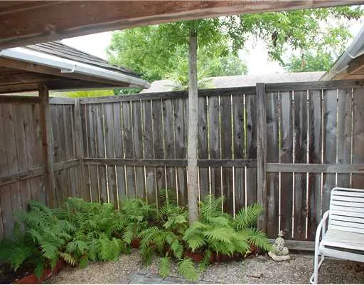 a view of a backyard with a garden