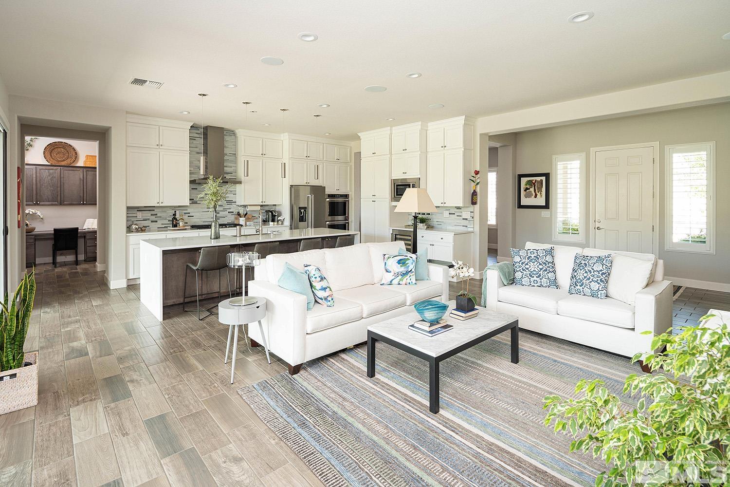 9579 Gazala Lane Reno, NV 89521 - Photo 3 of 40 a living room with furniture and a table