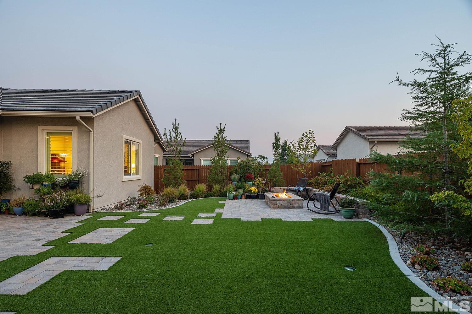 9579 Gazala Lane Reno, NV 89521 - Photo 39 of 40 a view of a house with a backyard and sitting area