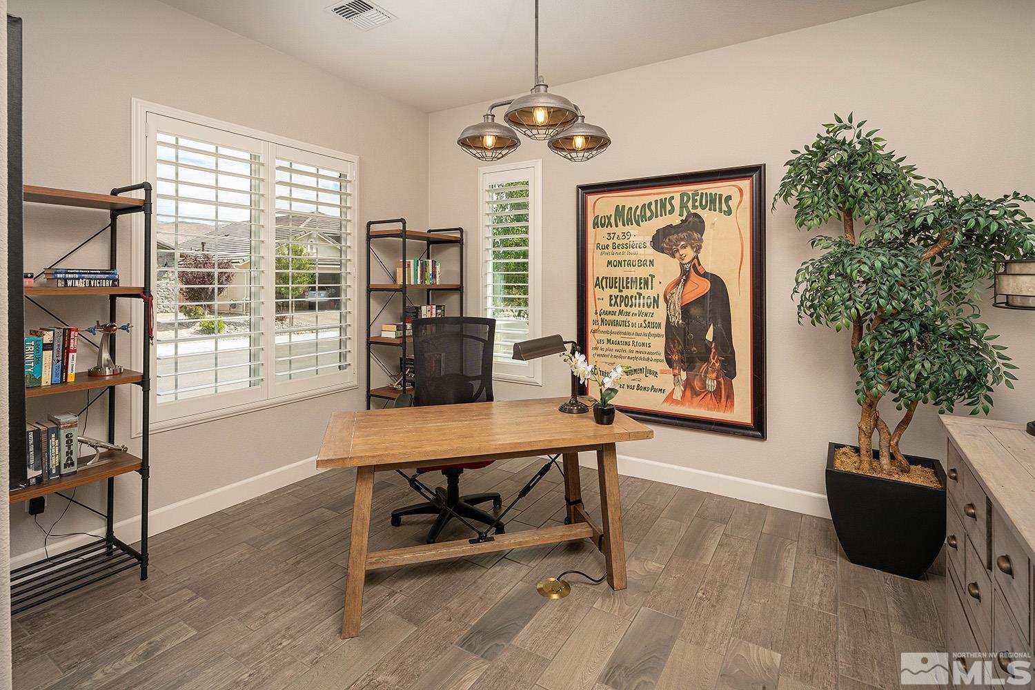 9579 Gazala Lane Reno, NV 89521 - Photo 8 of 40 a view of a livingroom with furniture and a window
