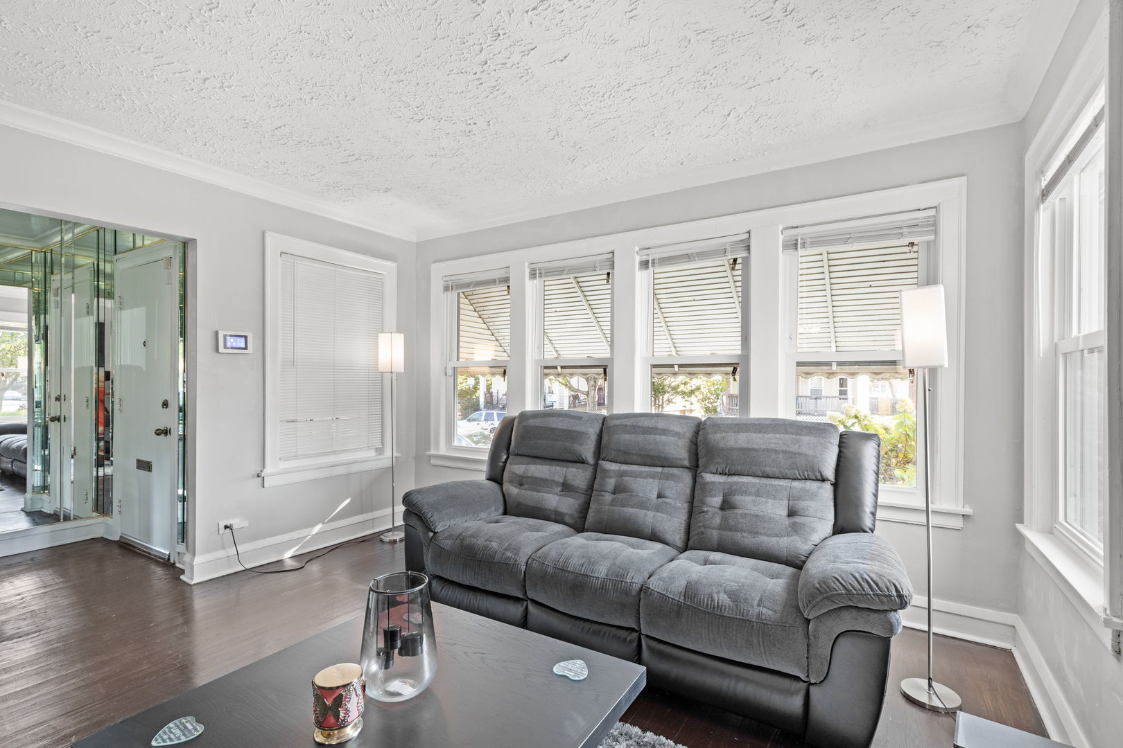 8438 South Morgan Street Chicago, IL 60620 - Photo 4 of 17 a living room with furniture and a window