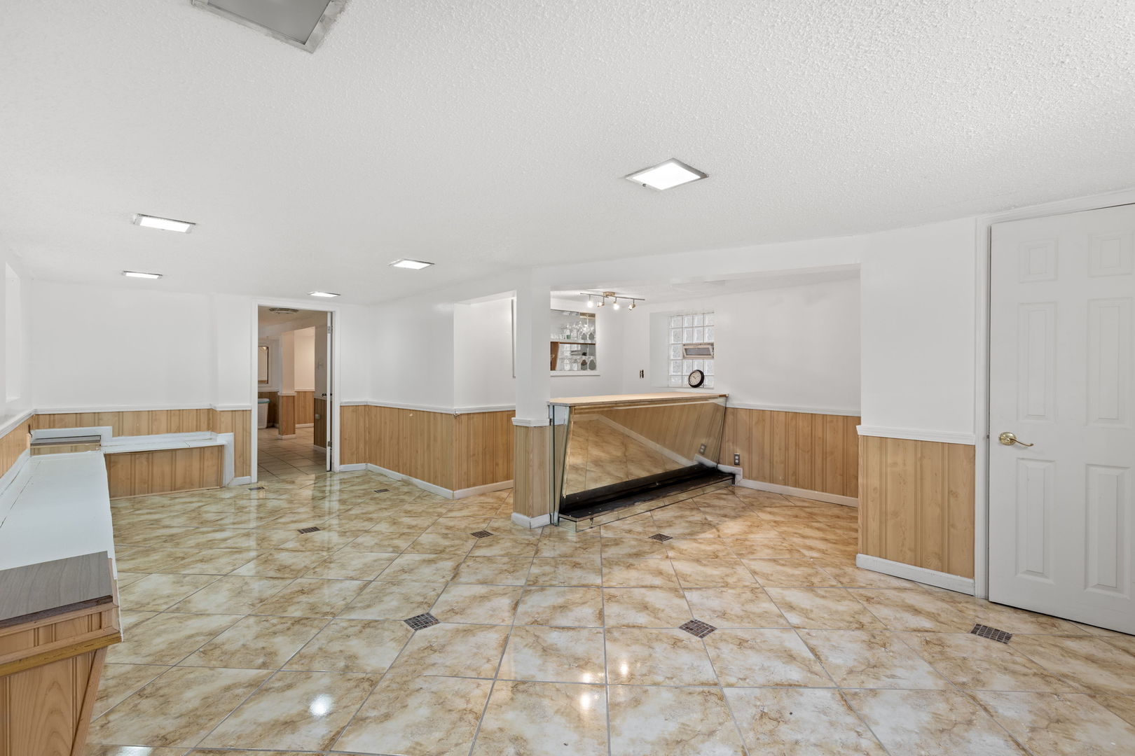 8438 South Morgan Street Chicago, IL 60620 - Photo 8 of 17 a view of an empty room with kitchen