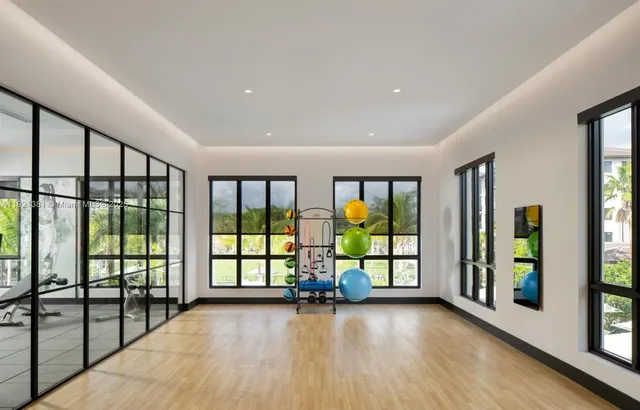 a very nice looking dining room with a large window