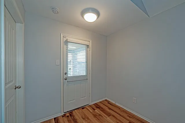 a view of a room with rack on the wall