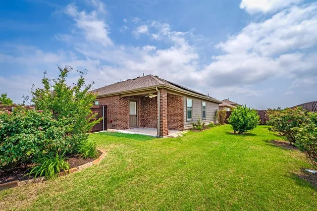 a view of a backyard with garden