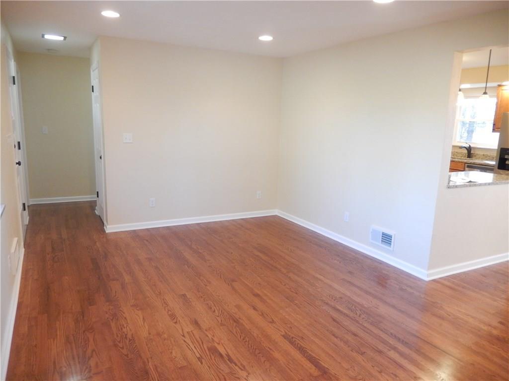 489 Cecil-Henderson Road Cecil, PA 15321 - Photo 8 of 25 Big Living Room with canned lights and gleaming Hardwood Floors