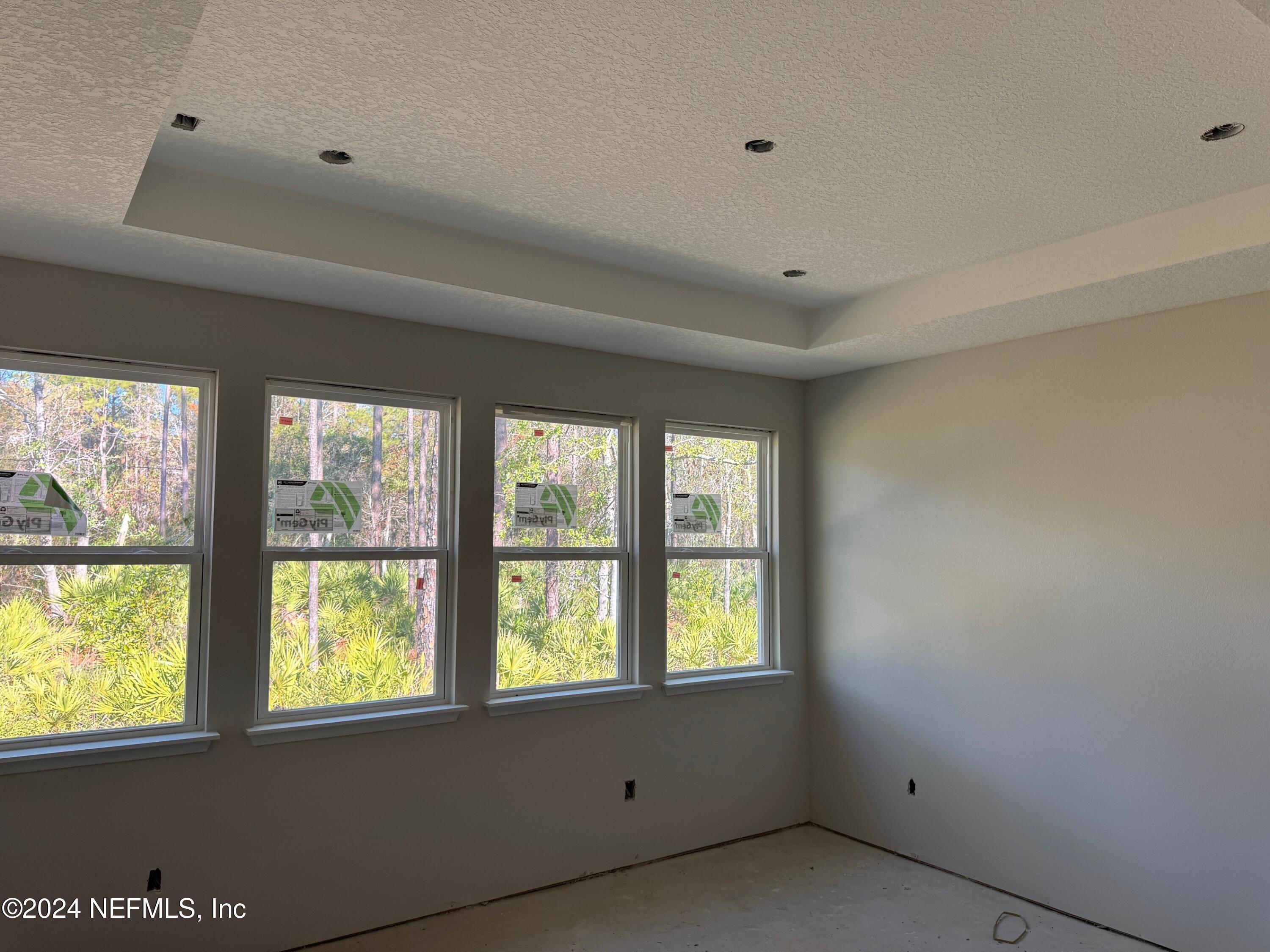 96157 Broadmoore Road Fernandina Beach, FL 32034 - Photo 12 of 15 Captiva 8 primary view with tray ceiling