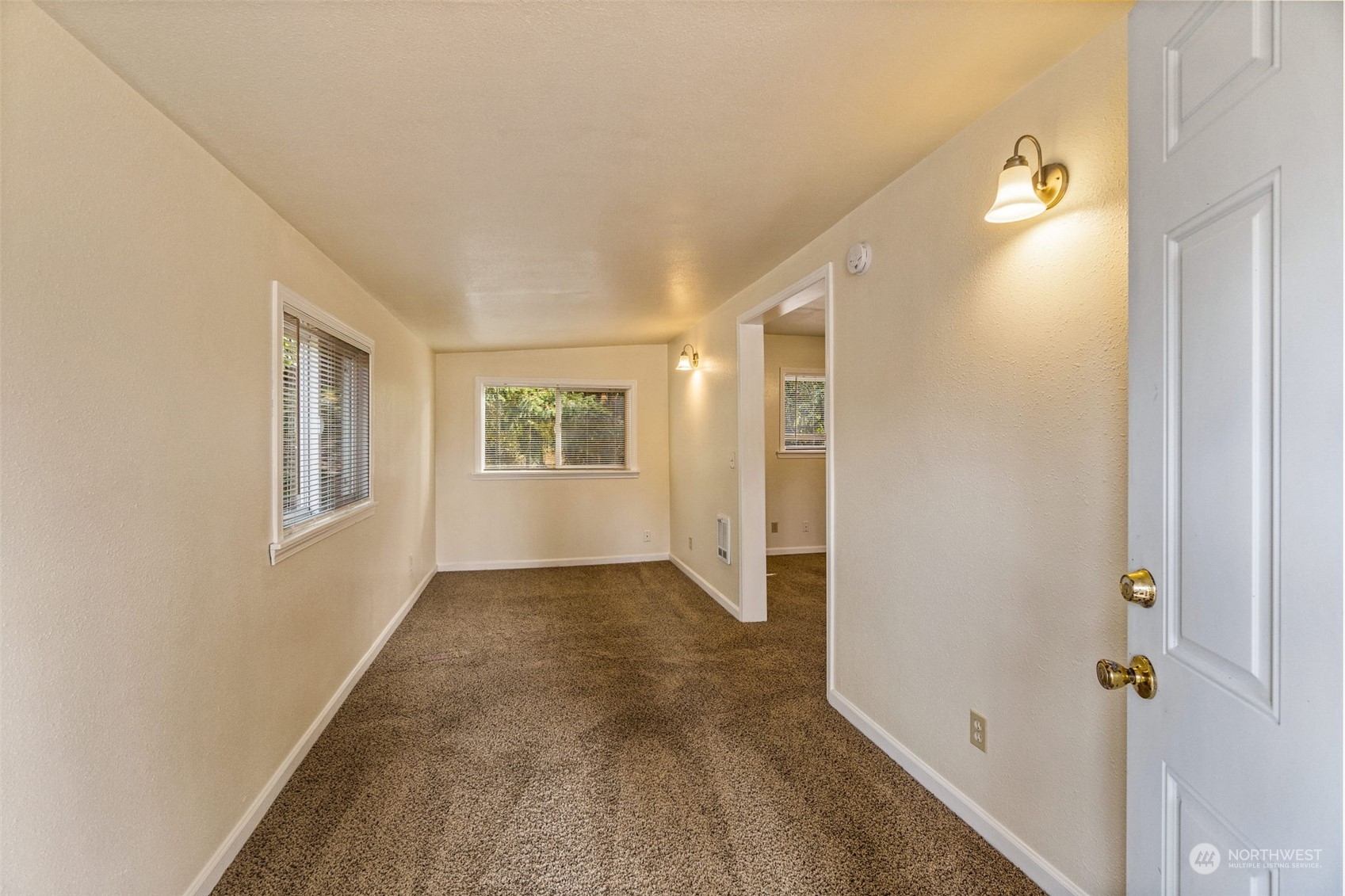 18127 Case Road Southwest Rochester, WA 98579 - Photo 25 of 37 a view of an empty room with windows